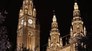 Vienna City Hall, Rathaus der Stadt Wien, illuminated up at night showing the  clock tower, Austria