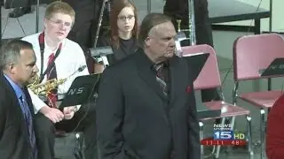 Music teacher honored, surprised with car