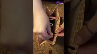 Closing a gift bag with its own string #bag  #hack #lifehacks #diygiftbag #shortsfeed #viralhacks