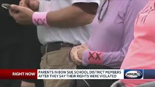 Parents involved in protest over transgender player sue school district, saying rights were violated