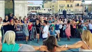Greek Dancing Zorba at the Port of Chania, Crete.