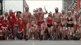 Swimsuit-clad joggers brave cold at Budapest&rsquo;s Santa run to raise money for charity
