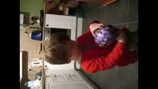 samuel opening his easter eggg