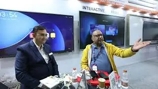 Education Fair Expo: Officials Conduct Product Review at Touchline Stall