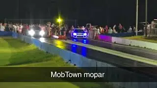 Members racing MobTown Mopar Mafia 