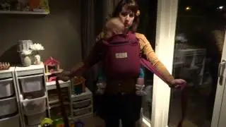 Storchenwiege Babycarrier knopen