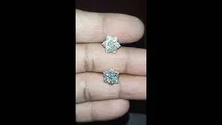 Seven stone's ear tops with Swarovski cubic zirconia, gold net weight 2.5gm only.