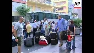 WRAP Aftermath of shelling, arrival of ship to evacuate foreigners, evacuees
