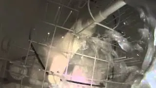 GE dishwasher inside view; cleaning poorly and not fully draining
