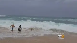 Man Saves Boy From Drowning From Powerful Waves
