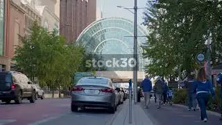 Pedestrians And Traffic On N Illinois Street, approaching Indianapolis Arts Garden, Indianapolis, US