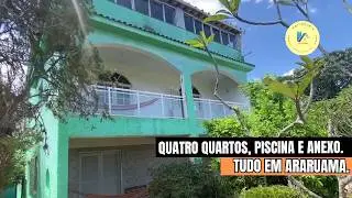 CASA COM QUATRO QUARTOS, DE FRENTE PARA A RODOVIA, EM ARARUAMA