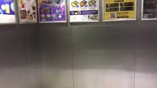 iPhone 7 camera test: Toshiba elevator @ Prangin Mall (up)