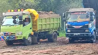 truk hino dan toyota jungkit muatan cadas
