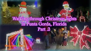 Walking through Christmas lights at Punta Gorda, Florida. Mus ncig saib Christmas lights. 1-16-26
