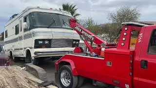 Light duty tow truck towing rv