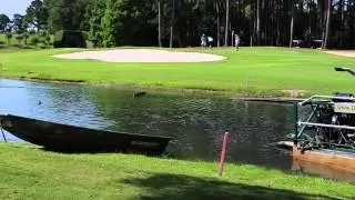 Dredging channel of golf course without interruption of players