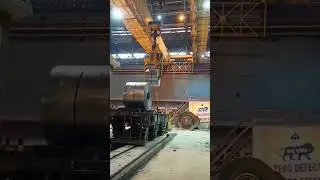 Overhead crane lifted the steel coil