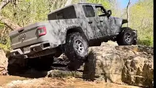 Jeep gladiator on 37s at southern Missouri off road ranch