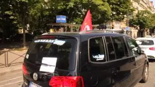 French taxi drivers block roads in strike against Uber