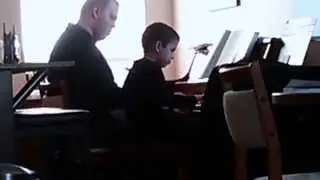 Daniel Beiser-Hunt (age 7) jams at the piano with David Rubel