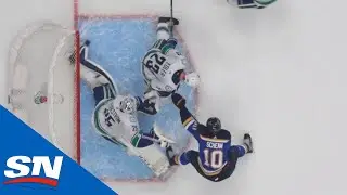 Jacob Markstrom Makes Sprawling Kick Save After Puck Deflects Off Alexander Edler
