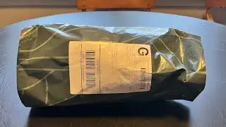 Opening my package from Corviforms with Parrotlet Plush Pal inside