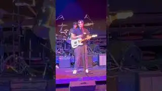 DRUMMER PERFORMS TIGHT GROOVE AS VOCALISTS HARMONIZE FOR INTENSE EMOTIONAL SONG