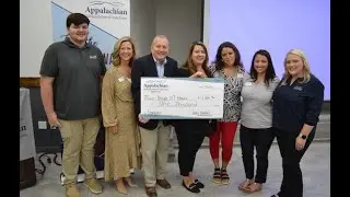 Appalachian Federal Credit Union surprises Isaiah 117 House with $1,000 donation
