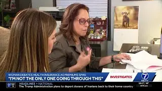 Woman debates health insurance as premiums spike