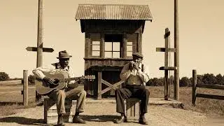 Blues Harmonica Accompanied by Acoustic Guitar in a Timeless Countryside Blues Performance