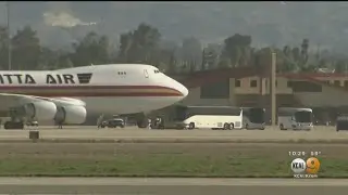 Plane From Wuhan, China Arrives At March Air Reserve Base