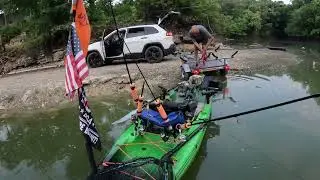 Loading my Perception Pescador pilot 120 ￼ on my custom Malone trailer with a Teak deck. ￼