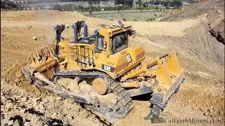 Some Big Cat's Working on Residential Grading Site