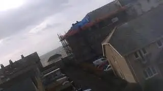 Profesional scousers staged a rooftop protest at Merryside jail outside bastion of socialism Anfield