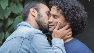 Wedding couple hugging and kissing affectionately