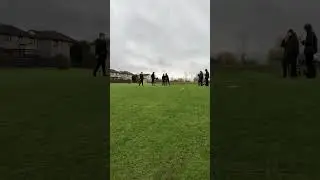 Kid does crazy knee slide down a hill