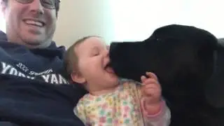 Baby loves her puppy