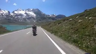 Motorcycle Adventure with Mountain Lake Views