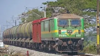 Wag9 green twin locomotive leads high speed oil tanker skipping #upleta station before #59562 