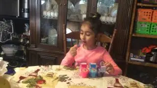 Celina is trying sour flush candy.