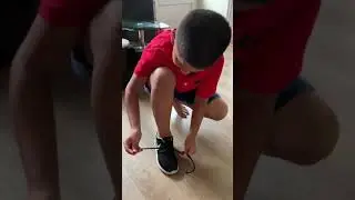 Anaas&rsquo;s first time tying shoe lace!!