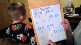 Charlie saying Jingle Bells notes by heart