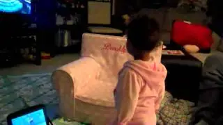 Brooklynn Daniel watching wheel