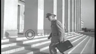 Chief of Staff of the US Army General George Marshall enters a government buildin...HD Stock Footage