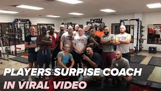 Arkansas football players shave their heads in support of coach's cancer diagnosis