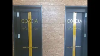 2 2014 Schindler 3300 MRL Traction Elevators with geometric decals@Coscia D.Store, Marcianise, Italy