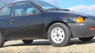 Electric Geo Metro spins tires on gravel