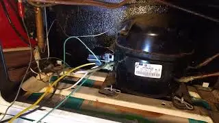 Find the suction line on a fridge or freezer compressor