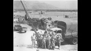 GMC DUKW Load CCKW , Caterpillar helps trucks off Landing ship. Utah beach July 1944. Jeep.